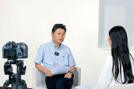 王梦江秘书长接受采访.jpg